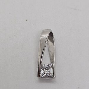 silver tone twist pendant with solitaire crystal
